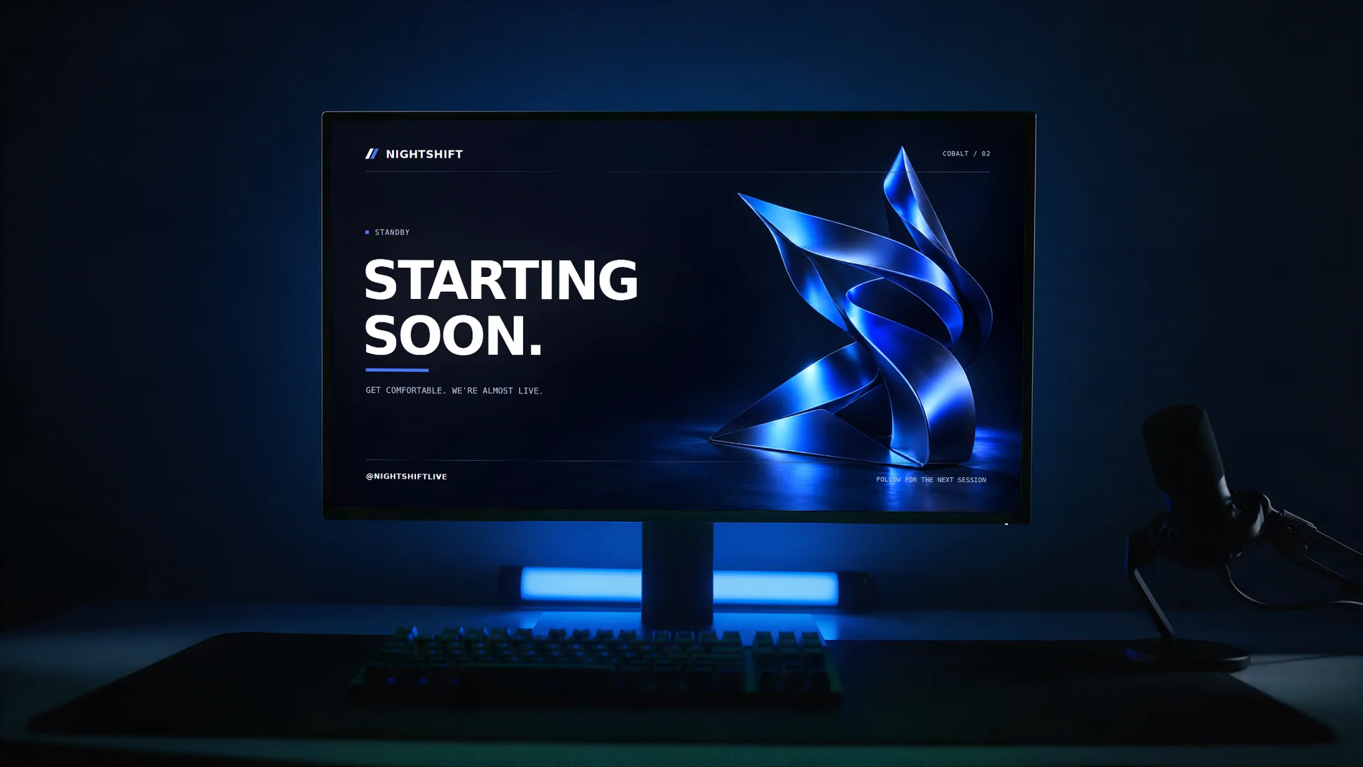 Cobalt scene personalized as NIGHTSHIFT on a desk monitor